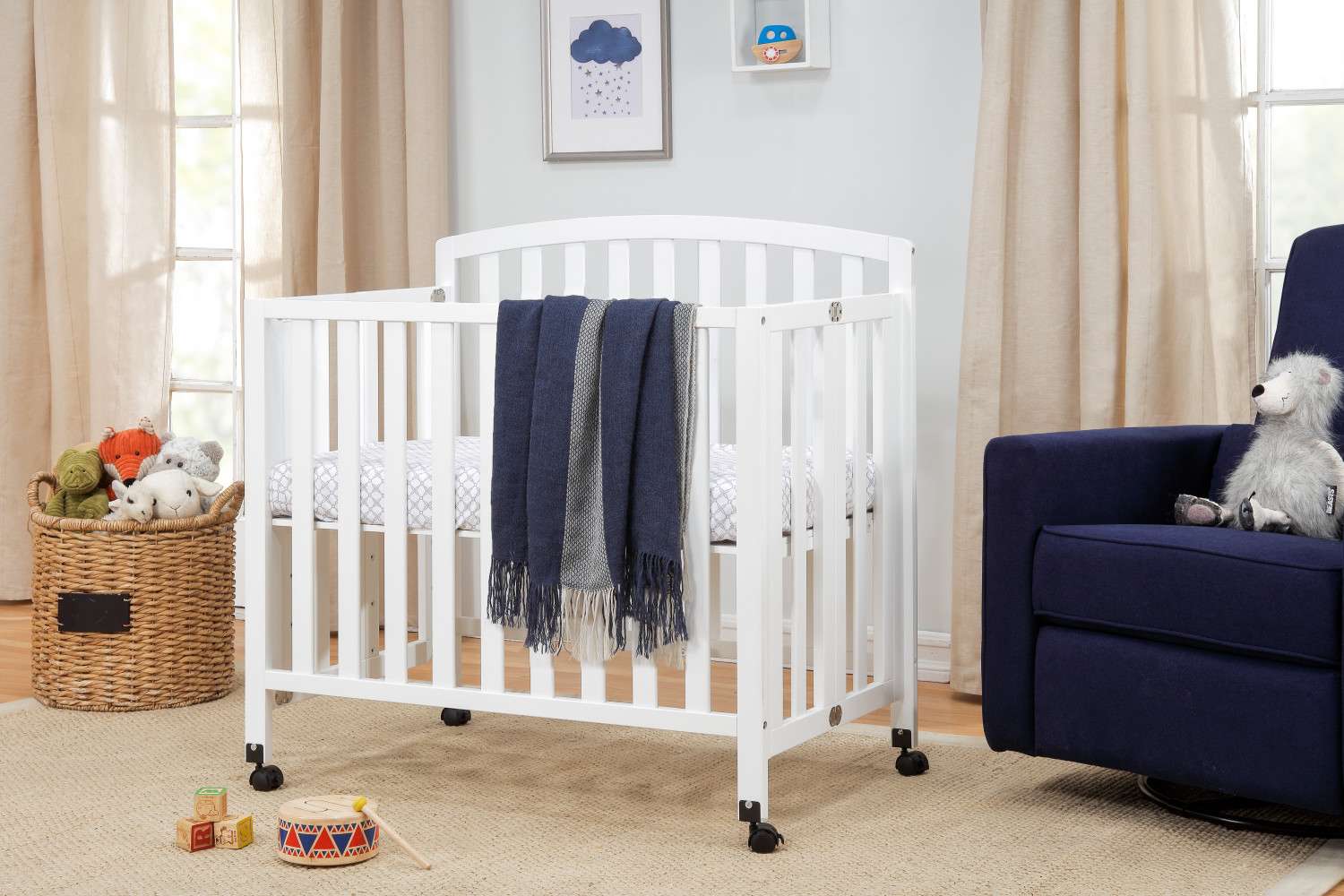 rolling mini crib